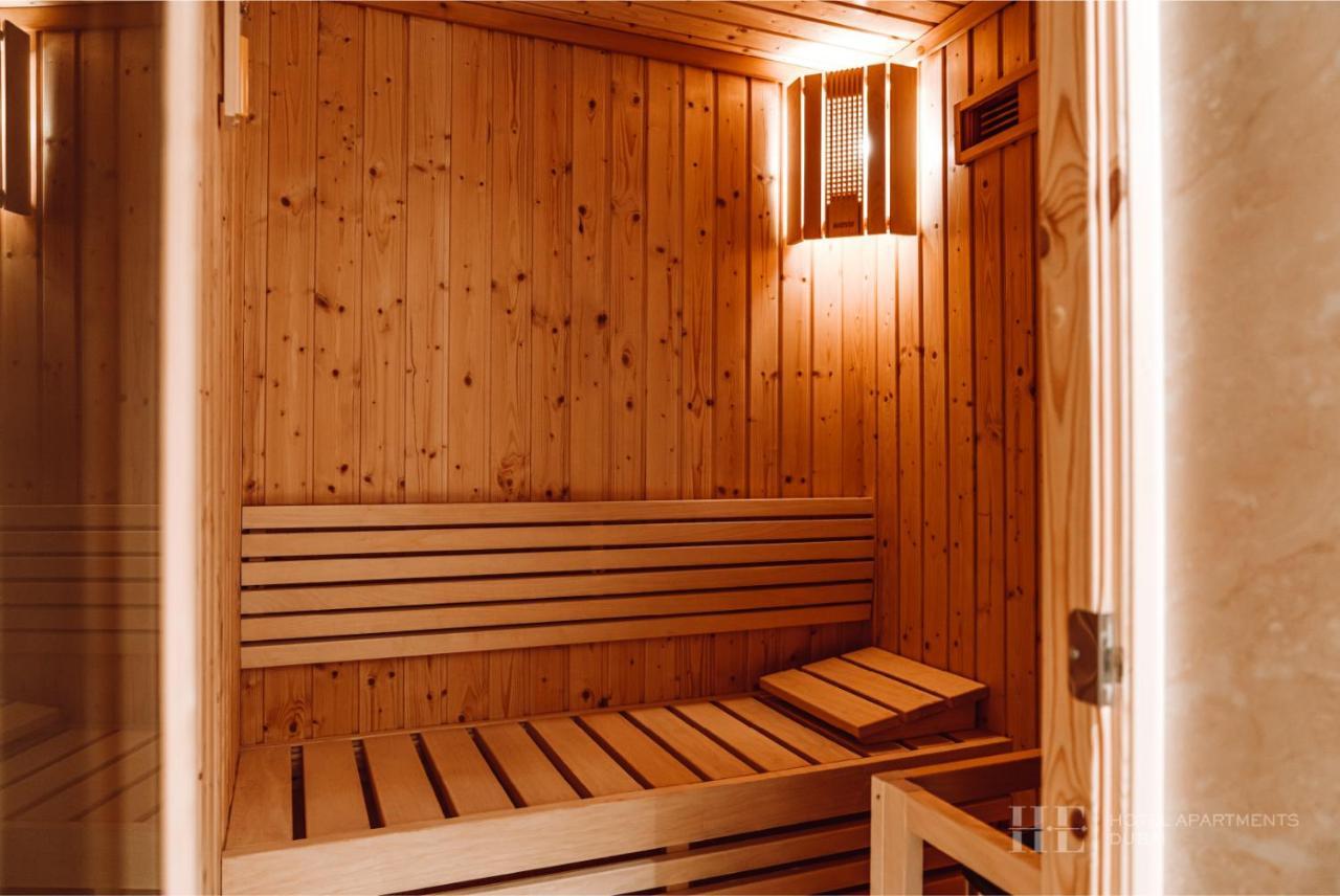 He Hotel Apartments Dubaj Kültér fotó A Finnish sauna